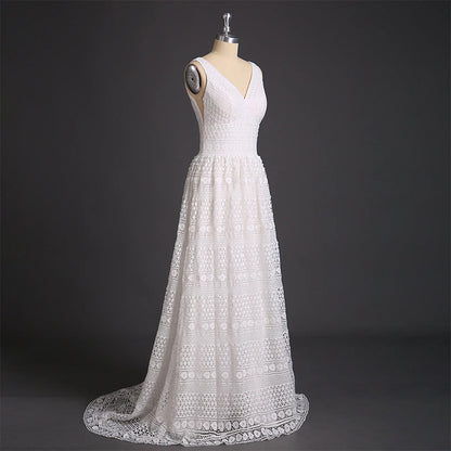 Elegant and high-end wedding dress with heavy lace